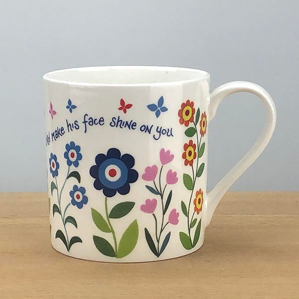 'Bless You and Keep You' bone china mug by Hannah Dunnett